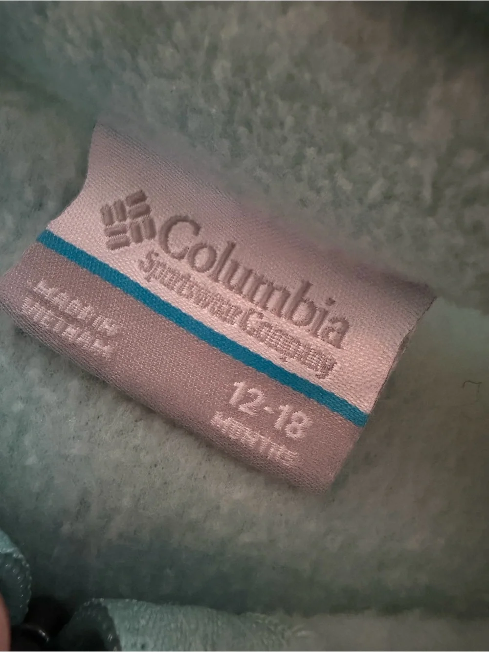 Columbia light teal and white fleece blanket or bedding - Columbia label visible